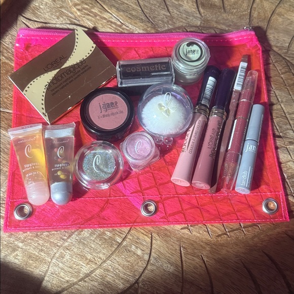 L'Oreal and assorted brands Glamorous Cosmetics in a neon zippered travel bag - Picture 1 of 2